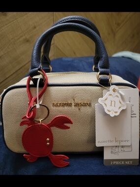 Nanette Lepore Beige Canvas Satchel with Navy Trim and Red Crab Charm